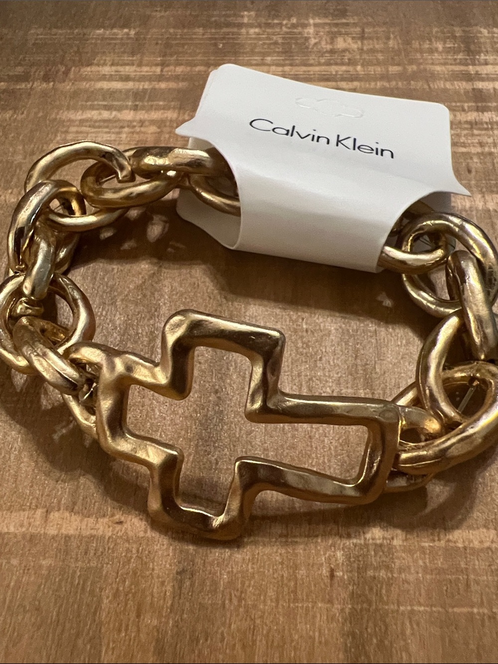 3/$18 Calvin Klein Gold Link Bracelet with Cross Center Lot 6098